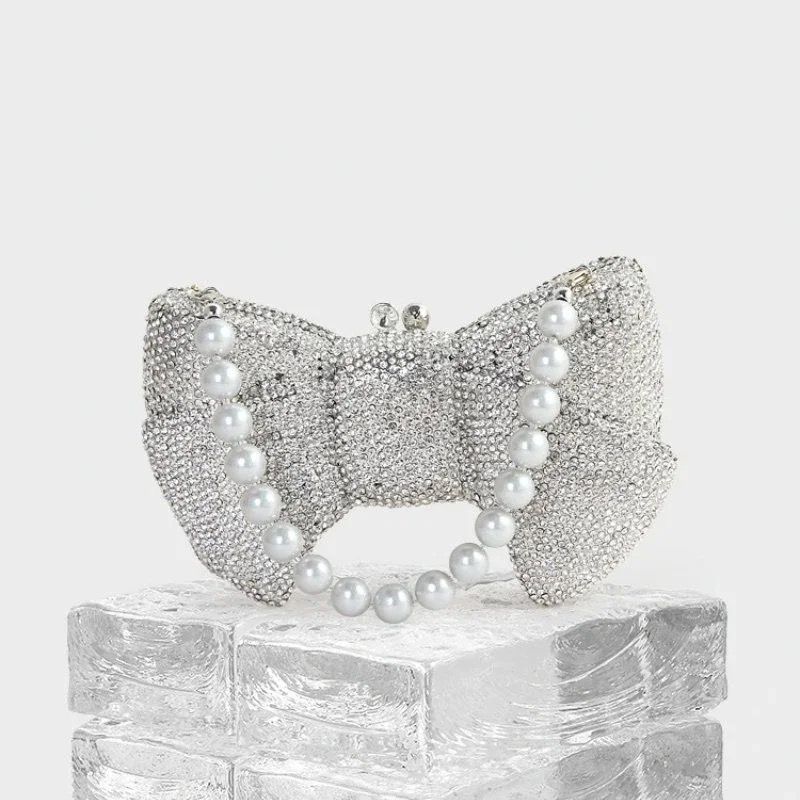 Zoe Bow Silver Clutch