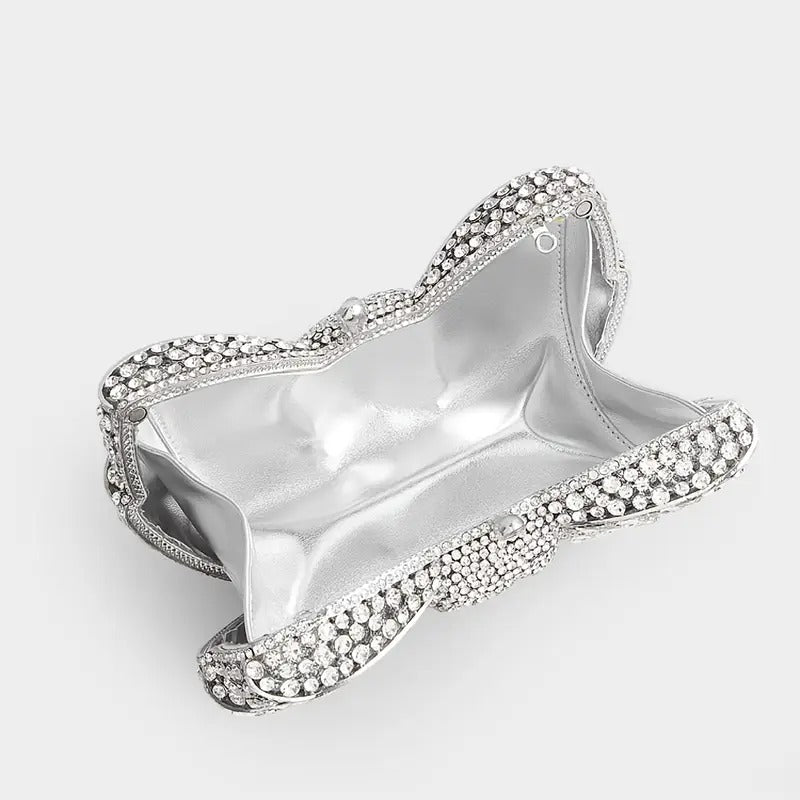 Radiant Silver Bow Clutch